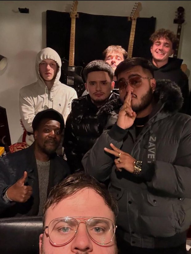 Participants and mentors together in the studio at the end of a session